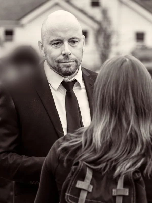 Harmen, founder of Sovereign Digital Solutions, in conversation with a group of young people